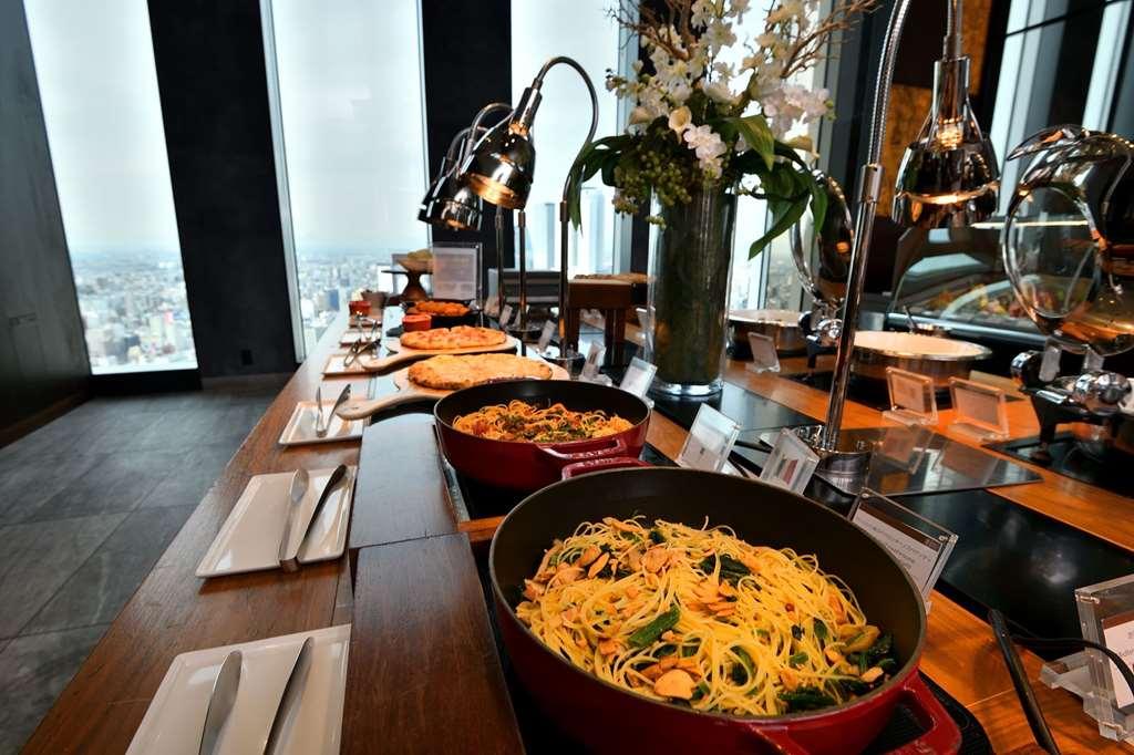 Nagoya Prince Hotel Sky Tower Εστιατόριο φωτογραφία A buffet at the 360 Restaurant in the 360° Sky Lounge, at the top of the Umeda Sky Building in Osaka, Japan